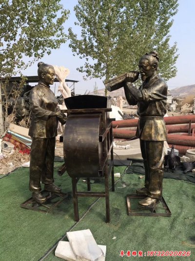 打谷机人物铜雕