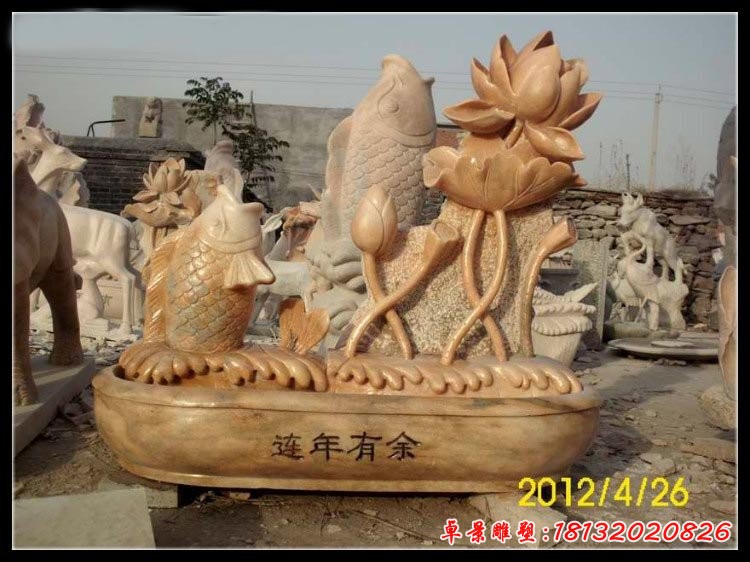 晚霞红连年有余石雕