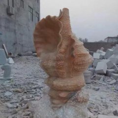 晚霞紅海螺石雕